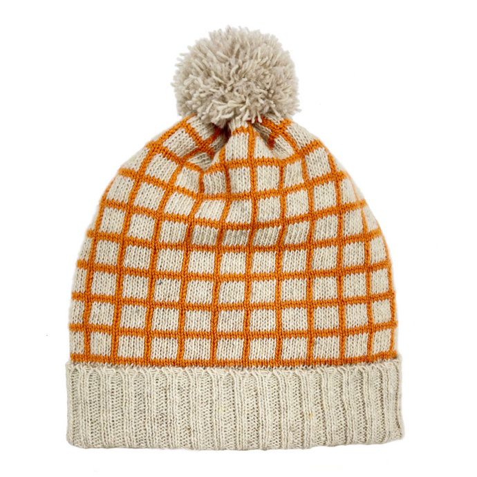Recycled wool beanie, cream coloured beanie with orange grid pattern and cream coloured pom pom